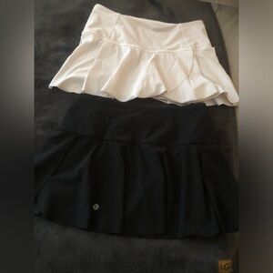 (2) Bundle Lululemon Hit your Stride skirts with shorts  size 6 small